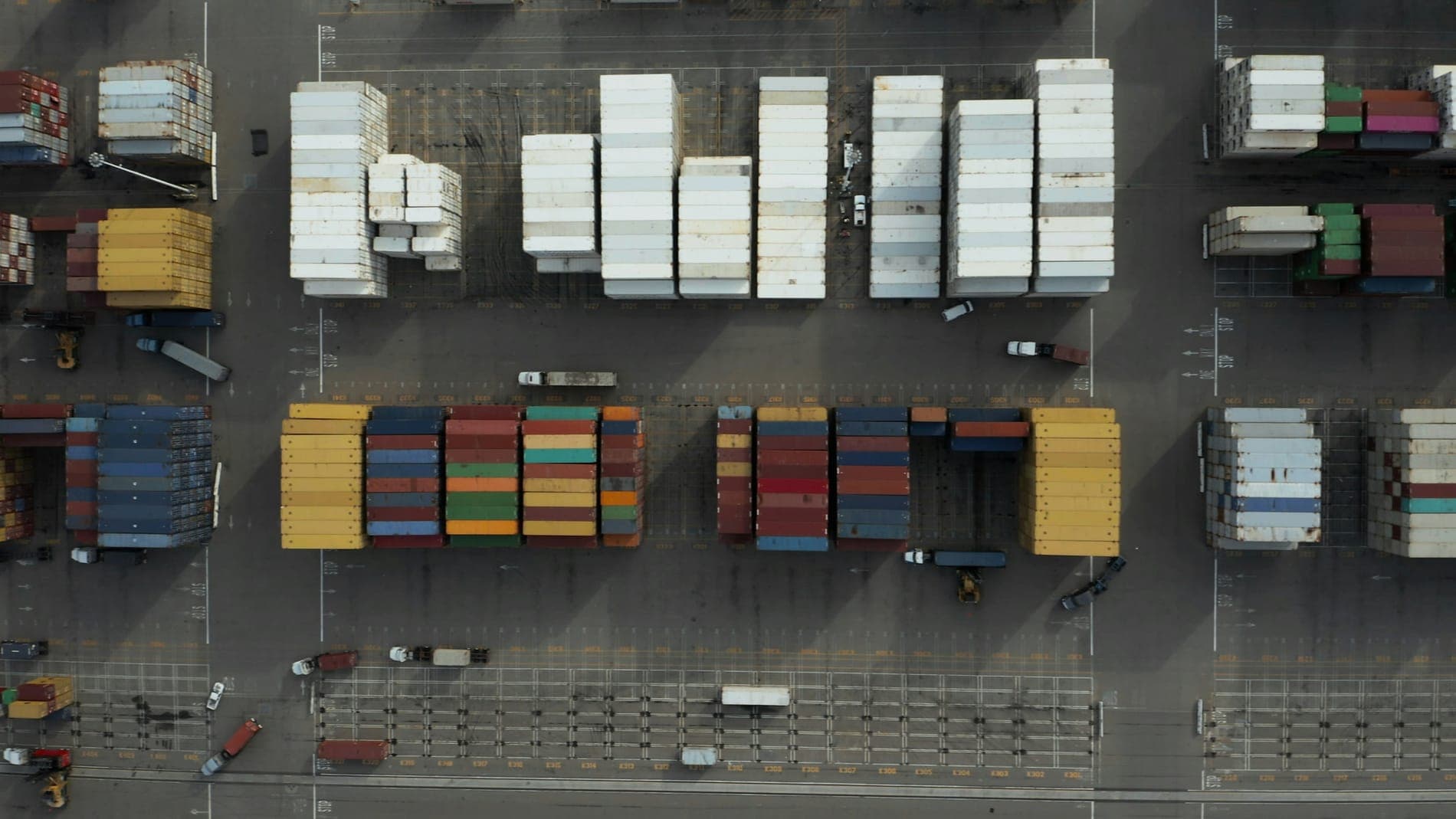 Aerial view of a container yard with colourful container stacks