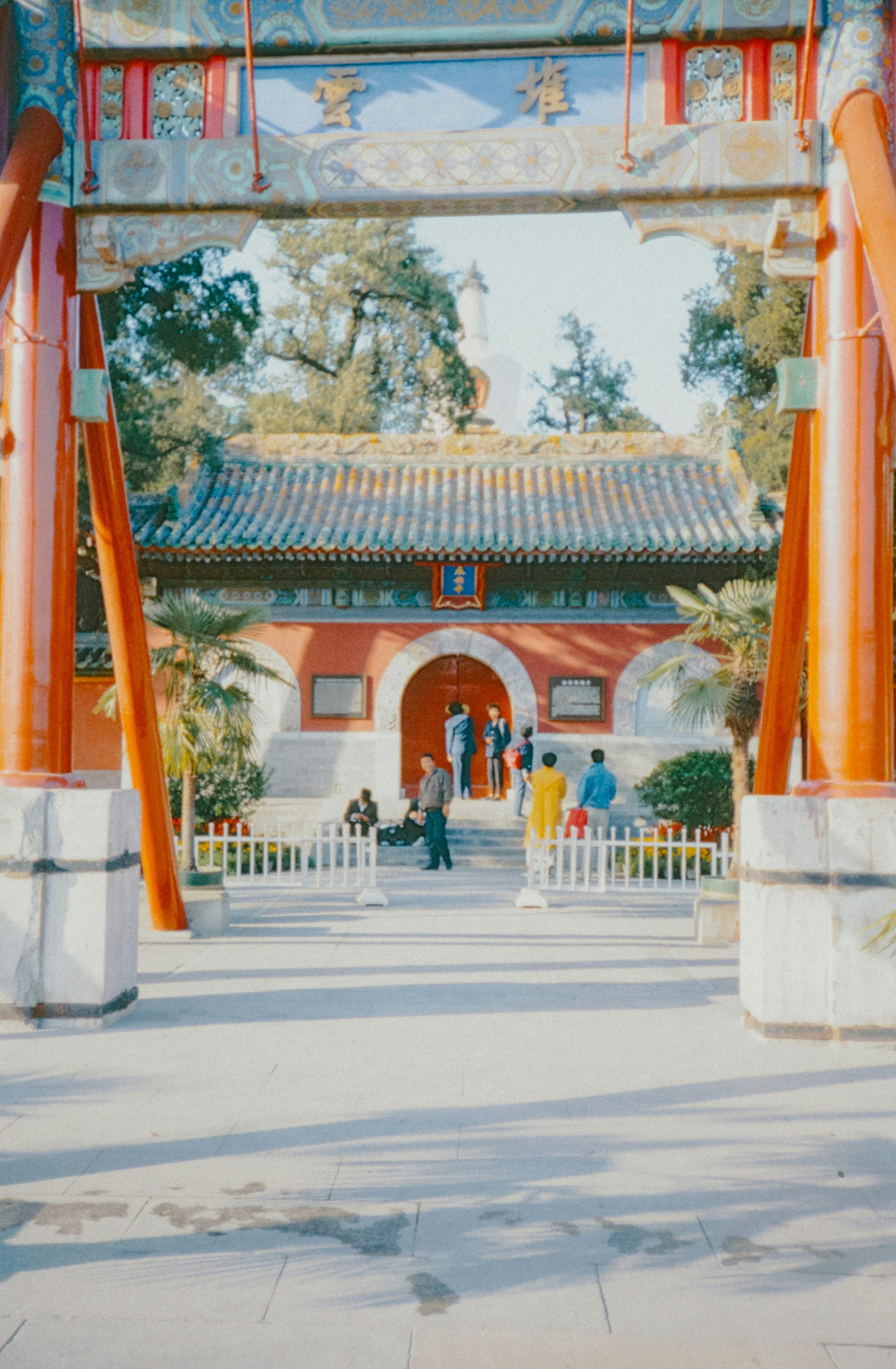 A traditional Chinese gate with a painted arch